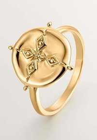 Anillo de oro con una superficie redondeada y lisa que presenta un diseño floral y cuatro elementos decorativos. Banda simple con un acabado pulido.