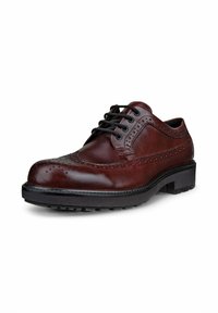 Heren bruine leren dresschoenen met decoratieve brogue-details, ronde neus en zwarte veters; rubberen zool met gestructureerd profiel voor grip.