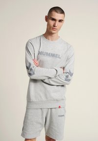 Hummel - Športni pulover - grey melange Miniaturna slika 1