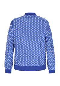 Blå bomberjakke med all-over tusindeblomstprint, med elastiske manchetter og kant, ribbet krave og letvægtsstof.