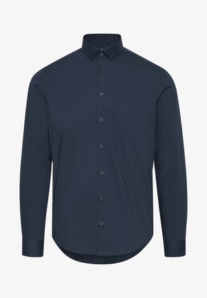Marineblå langærmet skjorte med knaplukning, lavet af glat stof. Har klassisk krave, knaplukning og buet kant.