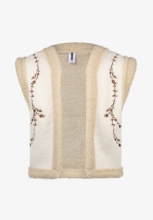 Beżowa, bezrękawnik o miękkiej teksturze. Ma haftowane kwiaty po bokach i puszyste wnętrze. Krawędzie wykończone są pluszowym wykończeniem.