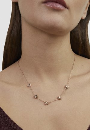 Rose gold necklace featuring six bead-like accents, delicate chain, smooth texture, and evenly spaced floral-like designs.