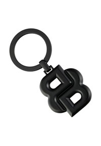 Black rubber keychain featuring an intertwined "B" design with a smooth texture. Integrated metal ring for attachment.