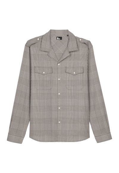 Camicia a maniche lunghe a quadri bianca e nera. Presenta un colletto, due tasche sul petto e epaulettes sulle spalle. Maniche lunghe con polsini abbottonati.
