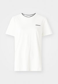 Valkoinen puuvillainen t-paita, jossa musta Adidas-logo vasemmassa rinnassa ja musta resorinen pääntie. Lyhyet hihat ja normaalisti istuva malli. Sileä pinta.