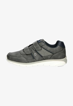 Gray athletic shoe with a perforated suede upper, two velcro straps, textured accents, and a white rubber sole.