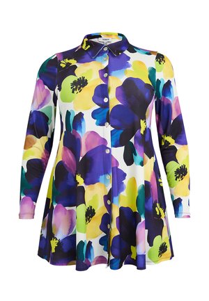 Langärmliges Hemd mit Knöpfen und ausgestelltem Saum, das ein lebhaftes Blumenmuster in Gelb, Lila, Blau, Grün und Schwarz auf weißem Hintergrund zeigt.