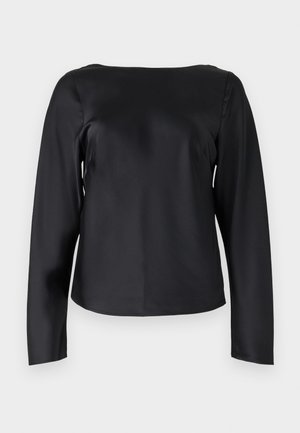 Must musta-särgid, mis on valmistatud siledast kangast, otse lõikega siluetiga ning laia ümarat kaelust, millel on minimaalne detail.