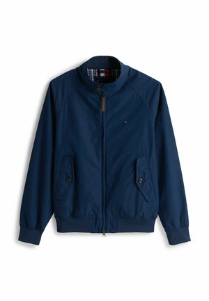 Giacca leggera blu navy realizzata in tessuto liscio, con zip frontale, due tasche laterali e fodera a scacchi. Accentuata da un piccolo logo.