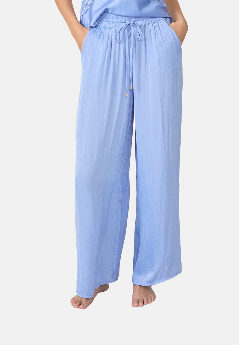 Lichtblauwe wijde broek gemaakt van zachte stof, met een elastische tailleband met een trekkoord en zijzakken.