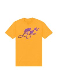 Žluté bavlněné tričko s krátkým rukávem, s fialovým geometrickým grafickým designem na přední straně. Standardní střih a kulatý výstřih.