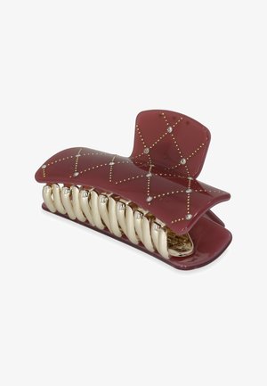 Fermaglio per capelli color bordeaux con finitura lucida, presenta dettagli in tonalità oro, decorazioni simili a diamanti e un design curvo con denti interlocking.