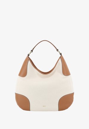 Beige canvas hobo bag with brown leather accents, rounded shape, single strap, and subtle logo detail near the base.