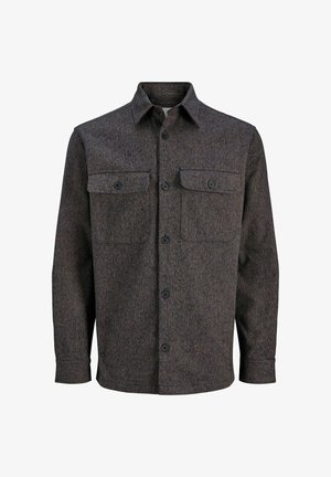 Tumši pelēka un brūna rakstaina flaneļa krekls ar pogātu priekšpusi, divām krūšu kabatām un klasisku apkakli. Teksturēts audums.