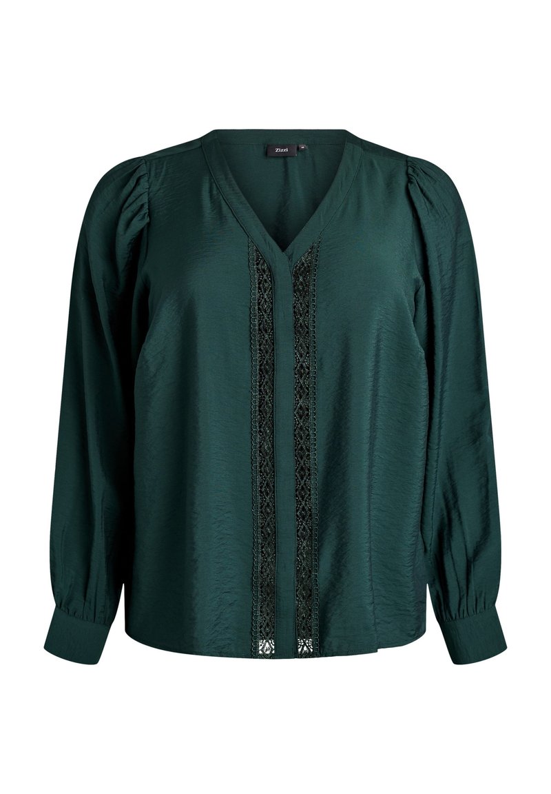 Blusa lungo verde scuro a maniche lunghe con scollo a V, spalle leggermente arricciate, polsini e un elegante bordo in pizzo verticale al centro davanti.