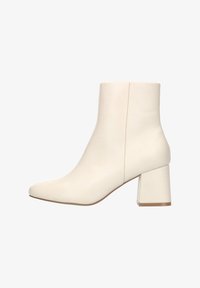 Sélectionné, off white