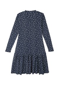 Dlouhý rukáv námořnické šaty s bílou skvrnitou texturou, žebrovaný materiál, kulatý výstřih a rozšířený volánový lem.
