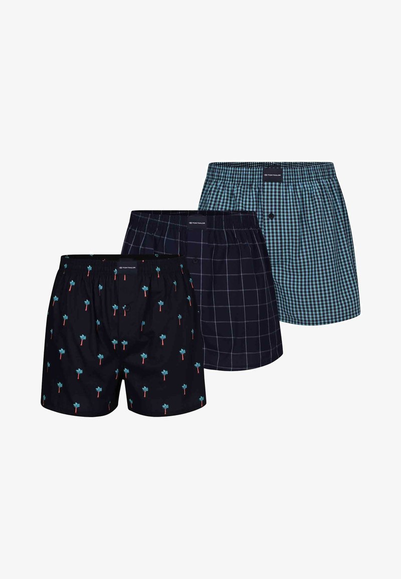 Tre paia di boxer da uomo: uno con stampa di palme blu, uno a quadri navy e uno a scacchi teal, tutti con cintura elastica.