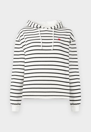 Hvit hettegenser med svarte horisontale striper, frontsnøring og et lite rødt hjerte brodert på venstre bryst.