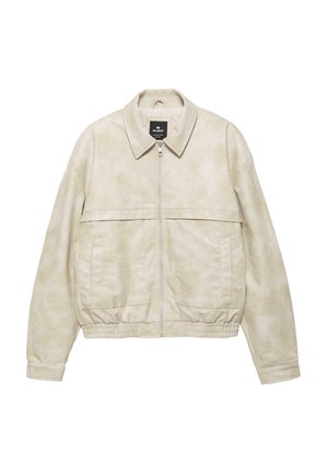 Svetlo bež jakna iz mehke umetne usnja. Ima ovratnik, zadrgo, elastičen spodnji rob in dva sprednja žepa.