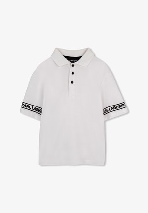 Polo bianca a maniche corte con bottoni neri e bande con la scritta "KARL LAGERFELD" su ogni manica.