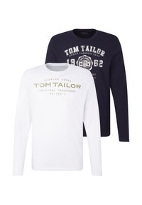 Δύο μπλούζες με μακριά μανίκια: η μία λευκή με πράσινο κείμενο, η άλλη μπλε-σκούρα με λευκά γραφικά. Και οι δύο έχουν στρογγυλή λαιμόκοψη και απαλό ύφασμα.