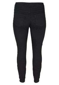 Pantalon slim noir vu de dos avec deux poches arrière et une taille ajustée sur fond blanc.