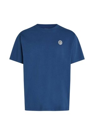 Niebieski bawełniany t-shirt z okrągłym dekoltem, krótkimi rękawami oraz okrągłą naszywką z logo na lewej piersi. Gładka faktura i luźny krój.