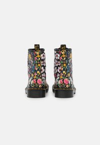Dr. Martens Stivaletti stringati - white