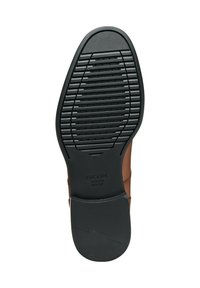 Scarpa in pelle marrone con una suola in gomma nera caratterizzata da scanalature orizzontali e piccole indentazioni circolari per una maggiore aderenza. Logo Geox visibile.
