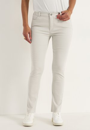 WITH ELASTICIZED WAIST - Slim fit -farkut - light beige
