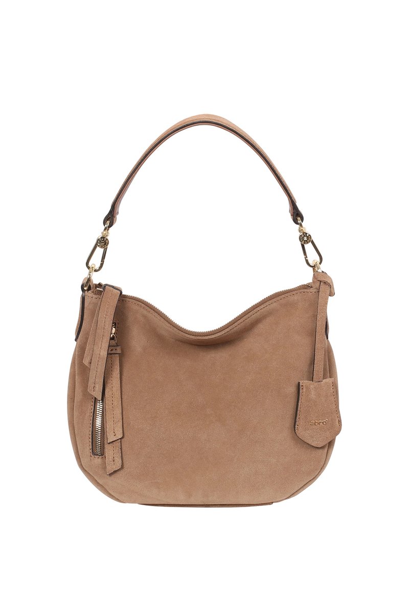 Brown suede shoulder bag with rounded shape, a top zipper, detachable tassel, and gold hardware accents. Smooth texture and minimalist design.