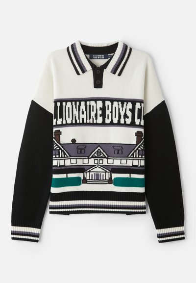 Adīts džemperis ar melnbaltu krāsu shēmu, kam ir apkakle, trīs pogas un grafiska mājas dizaina attēlojums uz priekšpuses.