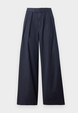 Navy wide-leg trousers with pleated front and stitched waistband. Made from a smooth, lightweight fabric, featuring a straight cut and no visible hardware.