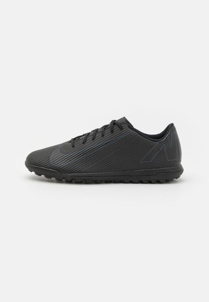Black athletic shoe with a textured surface, flat sole, and laces. Features subtle blue accents and a streamlined, angular design.