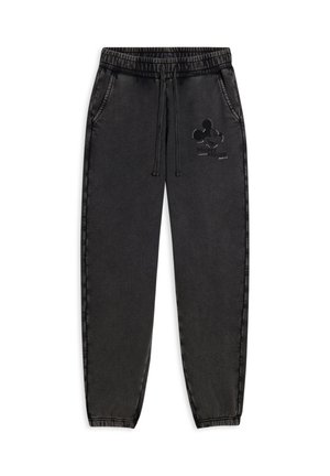 Pantaloni tuta neri con cintura elastica, coulisse, tasche laterali e una grafica di Topolino sulla coscia sinistra. Texture liscia.