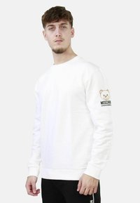 Selezionato, bianco