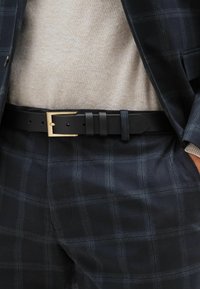 Next Gürtel - black gold