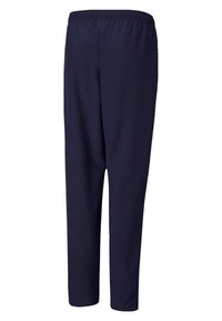 Marineblauwe, lichte broek met een relaxed fit, elastische tailleband en taps toelopende benen. Zachte textuur zonder zichtbare patronen of accenten.