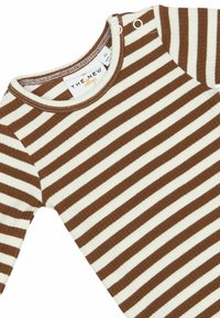 The New Siblings Bodi - toffee striped