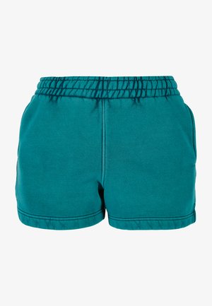 Teal cotton shorts with an elastic waistband, side pockets, and stitched hem details. Smooth texture and casual design.