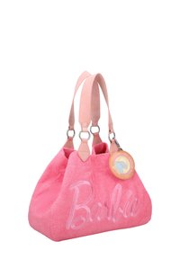 Roze badstof tote bag met de geperste tekst "Barbie" aan de voorkant, leren handvatten en een ronde tag met de tekst "Sterke meisjes maken golven."