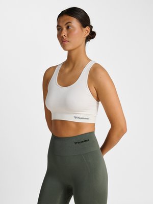 Hummel SEAMLESS - Sujetadores deportivos con sujeción media - white