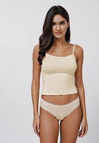 Light yellow camisole with thin straps and a fitted design, paired with matching briefs featuring lace trim and a small bow detail.