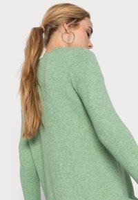JDY JDYMARCO LONG CARDIGAN - Cardigan - basil/melange