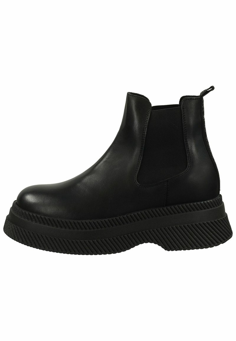 Stivali alla caviglia in pelle nera con pannelli laterali elastici e suola in gomma spessa e texturizzata. Presentano una linguetta sul retro per facilitare la calzata.