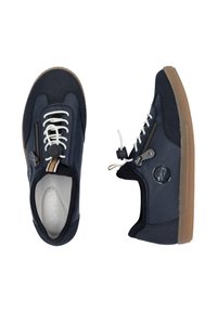 Navy blue athletic shoes made of fabric and rubber, featuring a zippered design, white laces, and a logo accent on the side.