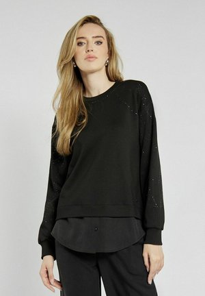 - Bluza