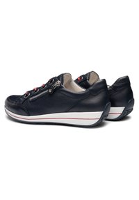 Paire de baskets noires basses avec des fermetures éclair latérales, des œillets à accents rouges et des semelles blanches avec fines bandes rouges.